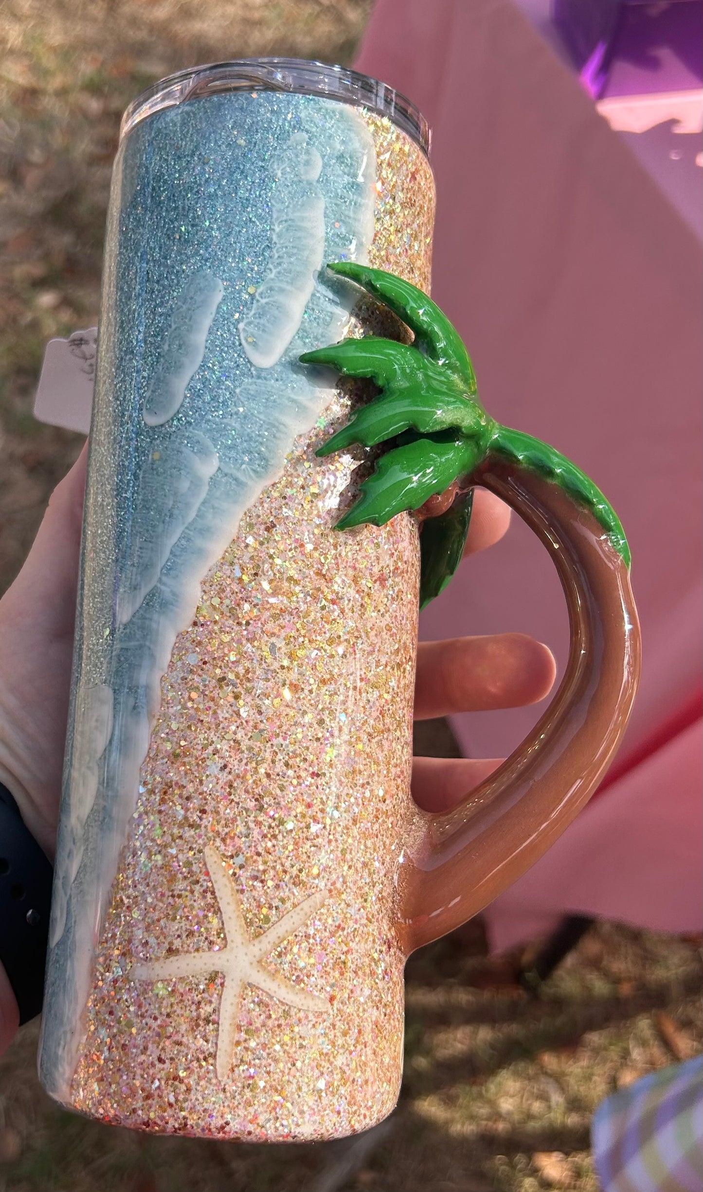 Beach with palm tree handle